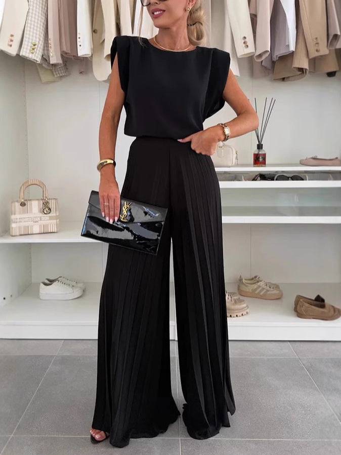 🇬🇧 Two-piece set with sleeveless top and round neckline and pleated wide-leg trousers😍